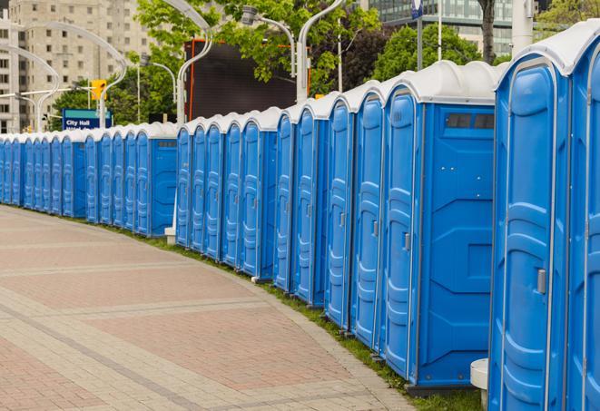 a row of portable restrooms at a trade show, catering to visitors with a professional and comfortable experience in Jean, NV